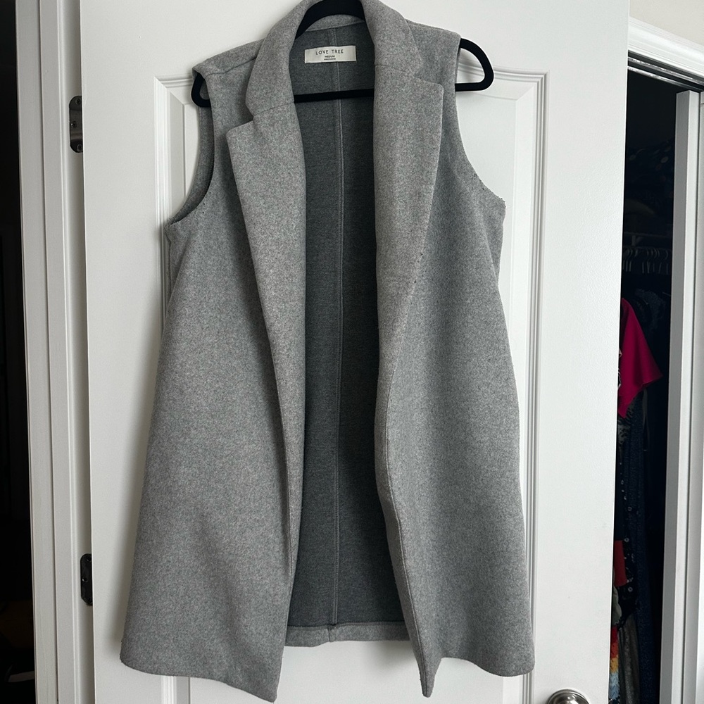 Sleeveless thick polyester coat